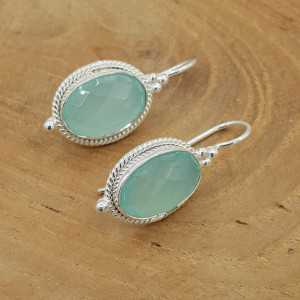Silver earrings set with oval faceted aqua Chalcedony