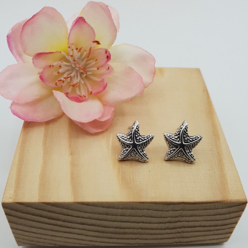 Zilveren zeester oorknoppen