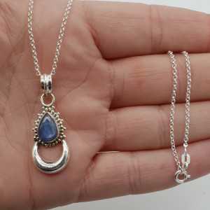 Silver necklace with moon pendant set with Kyanite