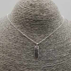 Silver necklace with feather pendant