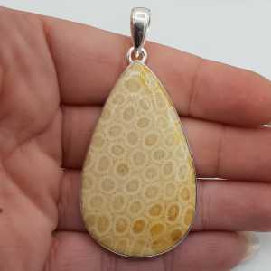 Silver pendant set with large teardrop shaped Fossil Coral