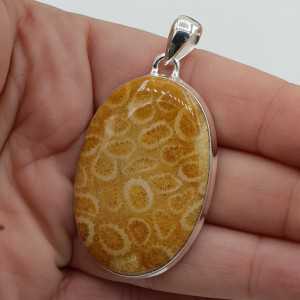 Silver pendant set with oval Fossil Coral