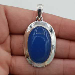 Silver pendant oval shaped blue Chalcedony in a tight setting