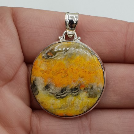 Zilveren hanger gezet met ronde Eclipse steen