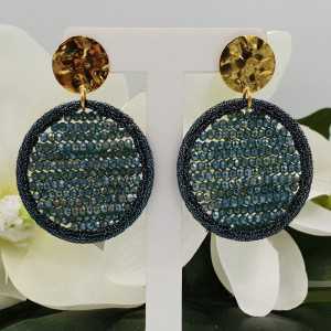 Gold plated earrings with round pendant of silk thread and crystals