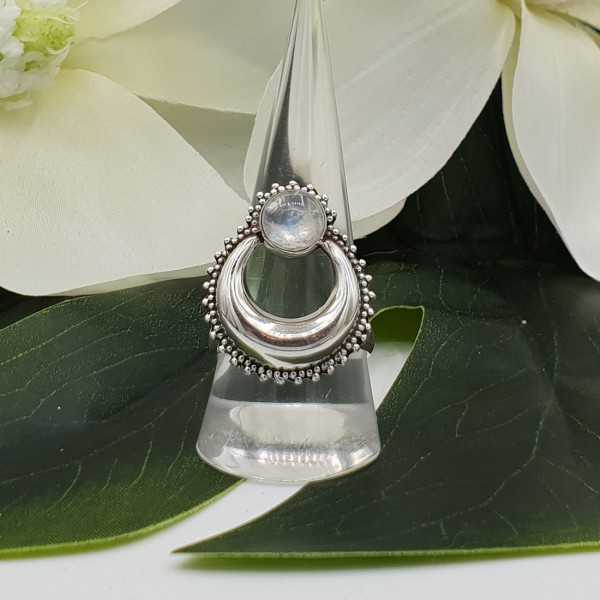 Silver half-moon ring set with round rainbow Moonstone