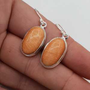 Silver earrings set with oval Celestobariet