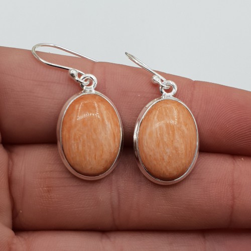 Zilveren oorbellen gezet met brede ovale Celestobariet