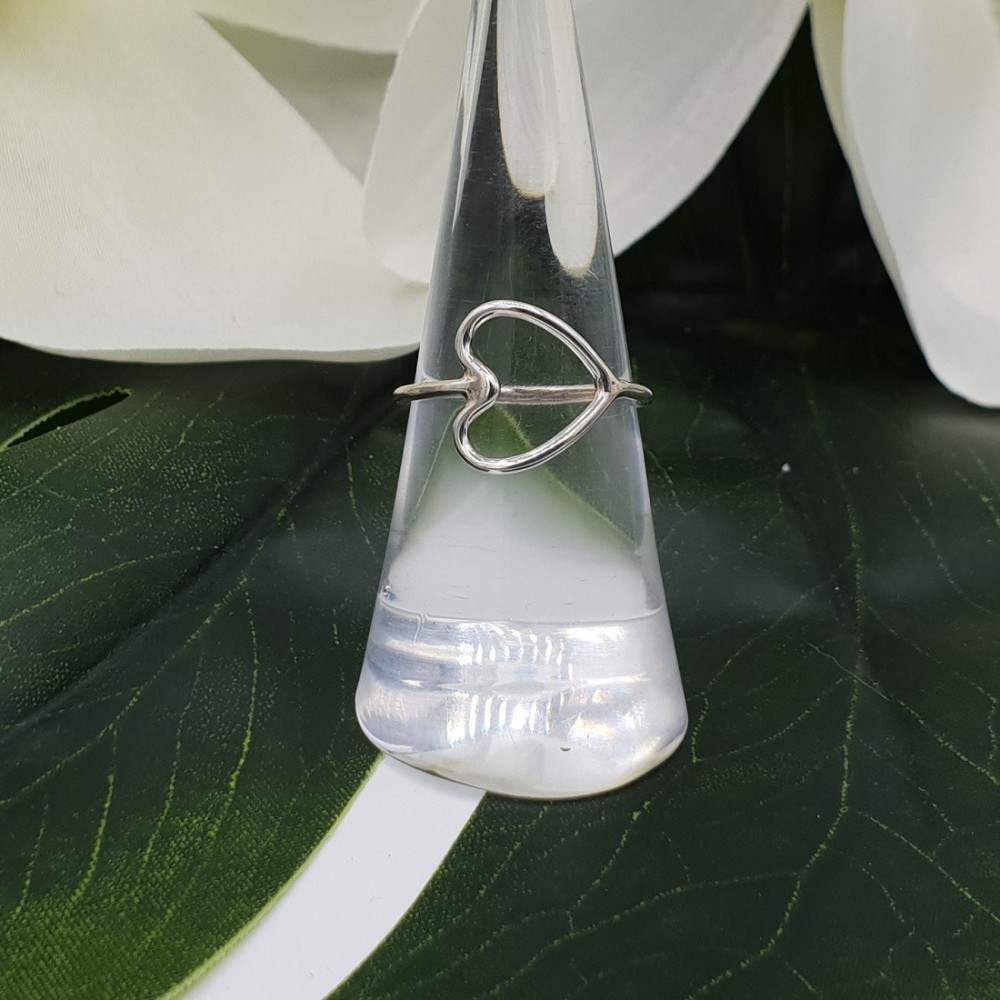 Silver ring with open heart