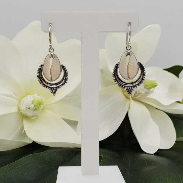 Silver earrings set with Cowrie shell