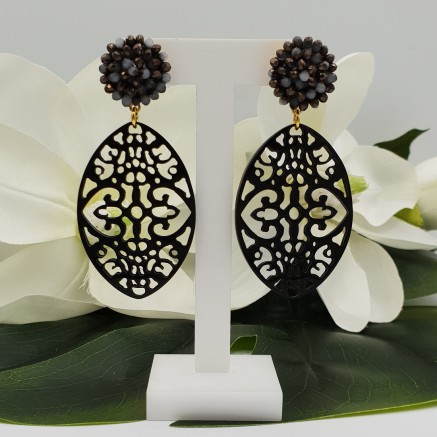 Vergulde oorbellen met kristallen en Buffelhoorn hanger