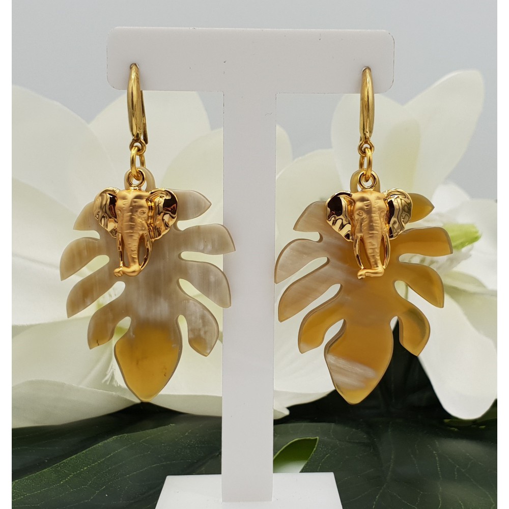 Gold plated earrings with leaf of buffalo horn and elephant charm