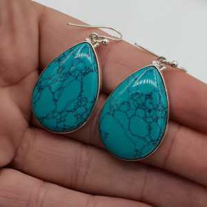 Silver earrings with large teardrop shaped Turquoise