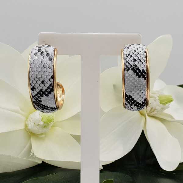 Gold creoles with snakeskin print