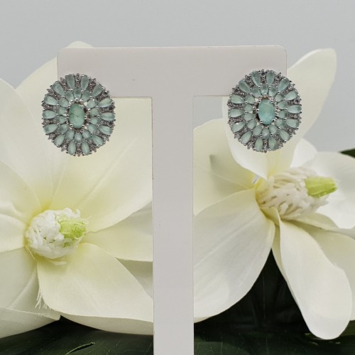 Zilveren oorbellen gezet met facet geslepen aqua Chalcedoon