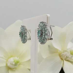 Silver earrings set with facet cut aqua Chalcedony