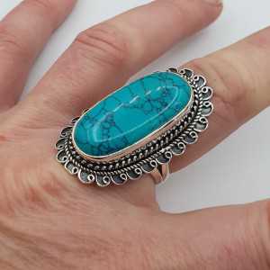 Silver ring set with Turquoise and carved head 18 mm