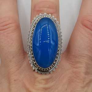 Silver ring with blue Chalcedony and carved head 19 mm