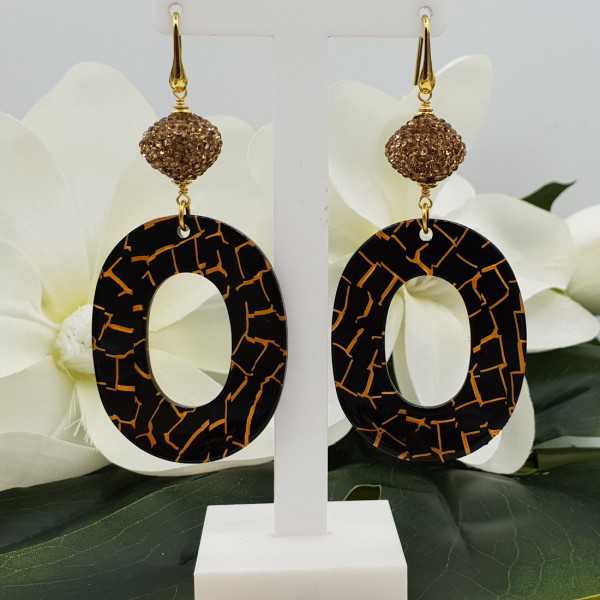 Gold plated earrings with golden crystal and resin