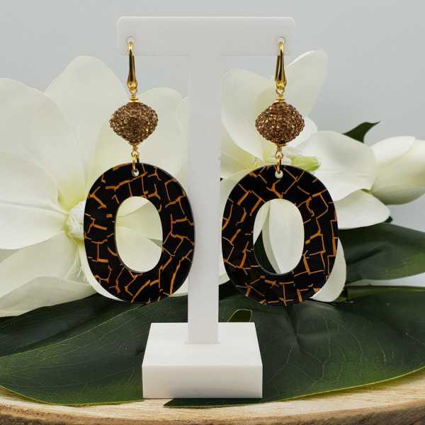 Gold plated earrings with golden crystal and resin