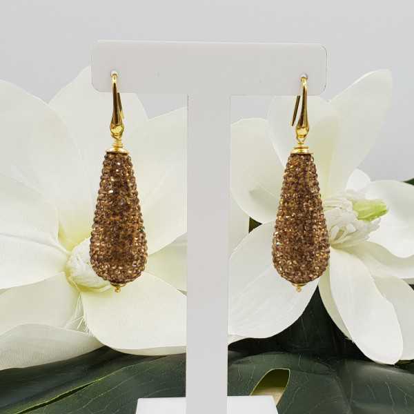 Gold plated earrings with large drop of golden crystals