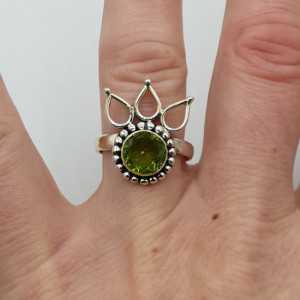 Silver boho ring set with round faceted Peridot 16.5 mm