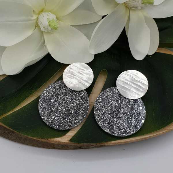 Silver earrings with large round silver glitter resin