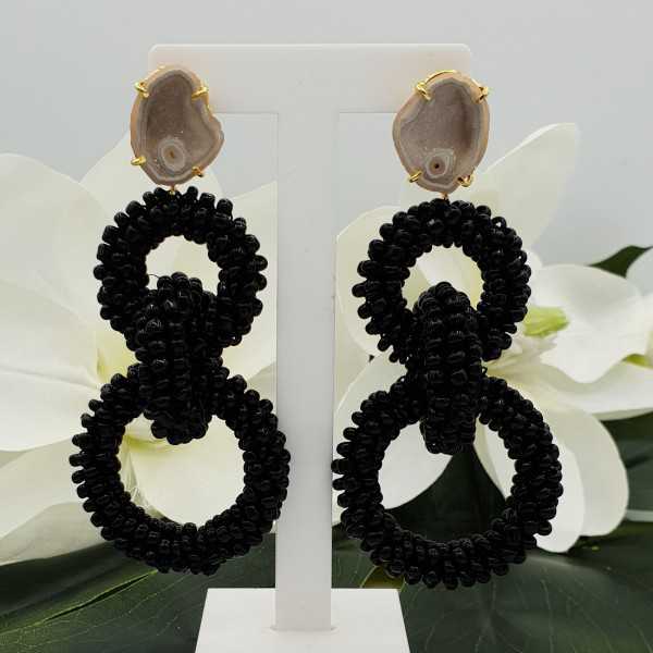 Earrings with Agate geode and rings of black beads