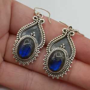 Silver earrings with oval cabochon Labradorite in any setting