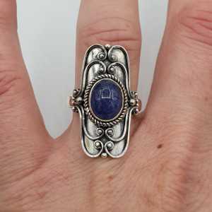 Silver ring set with oval cabochon Tanzaniet