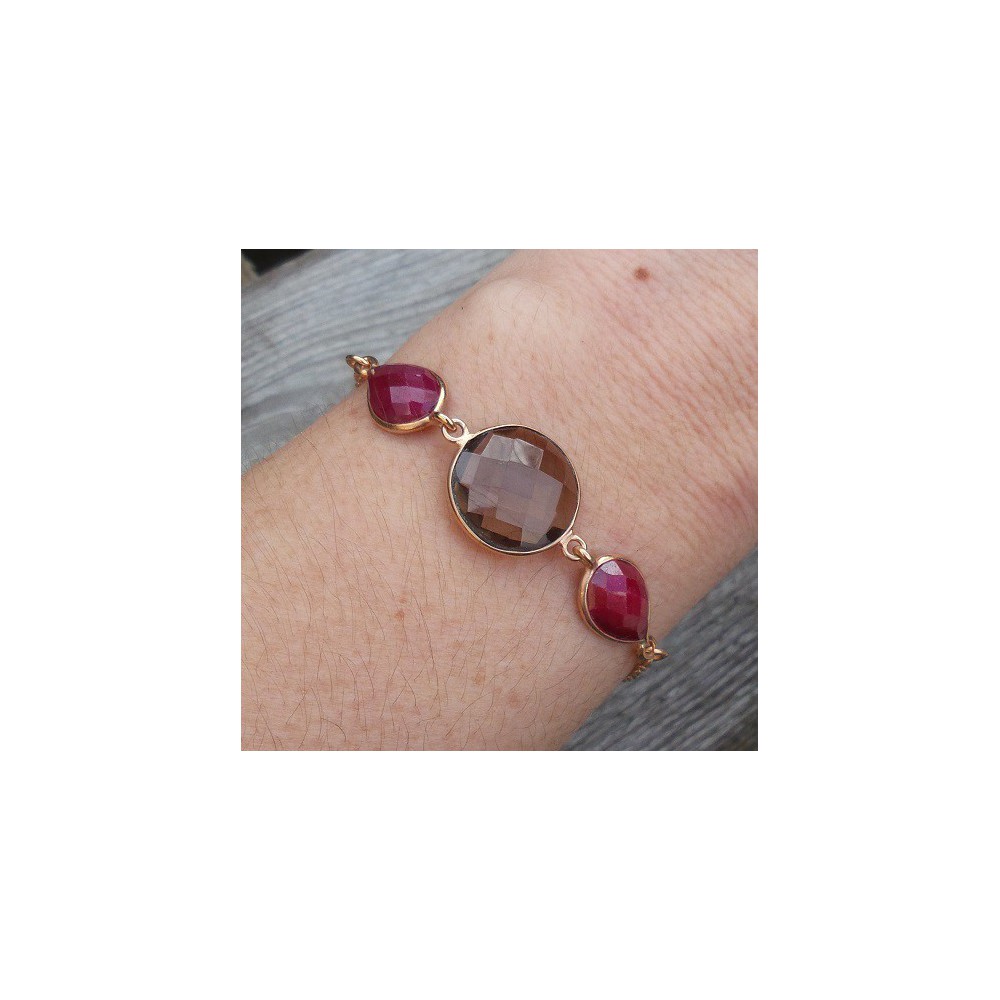 Gold plated bracelet set with round Smokey Topaz and Rubies 