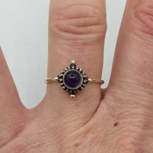 Silver ring set with a small round Amethyst 16.5 mm