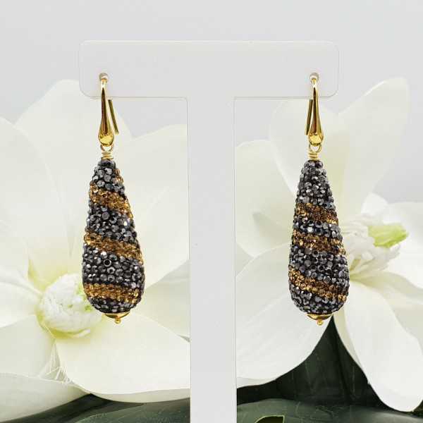 Gold plated earrings with drop of golden and black crystals