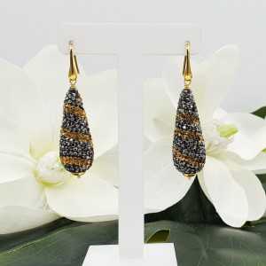 Gold plated earrings with drop of golden and black crystals