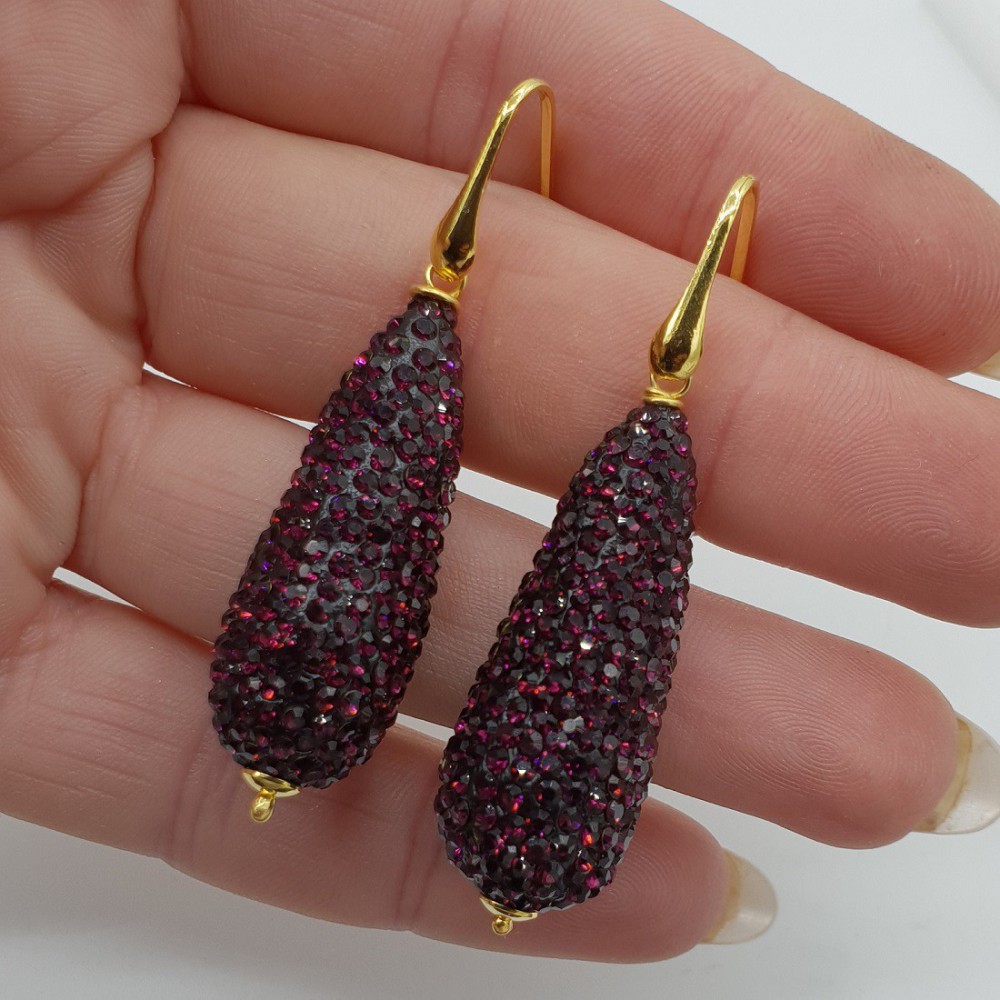 Gold plated earrings with drop of purple crystals