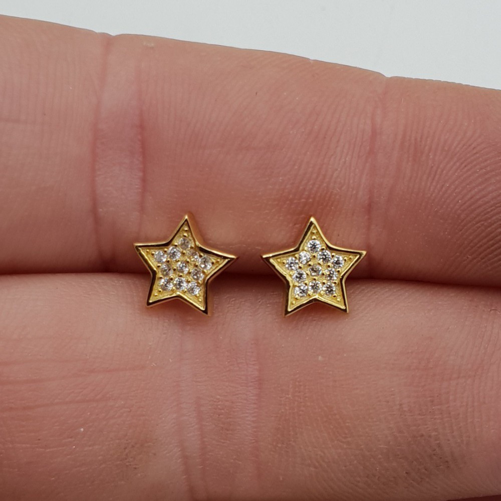 Gold plated oorknoppen star, set with Zirconia