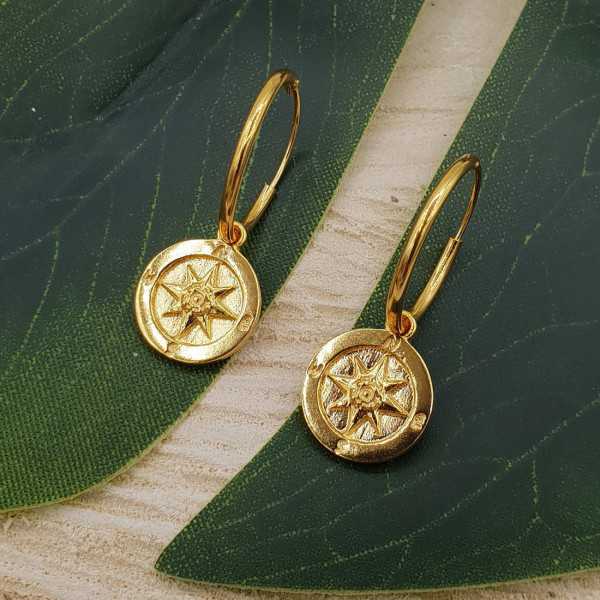 Gold-plated creoles with compass pendant