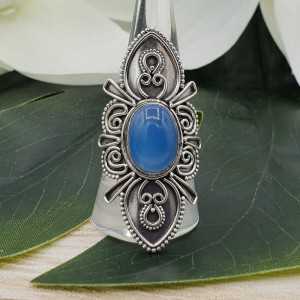 Silver ring set with blue Chalcedony and carved head 19 mm