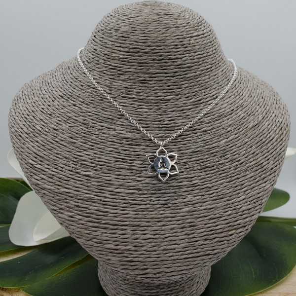 Silver necklace with lotus pendant with meditating Buddha