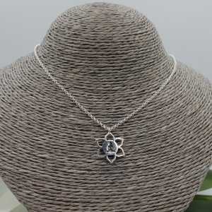 Silver necklace with lotus pendant with meditating Buddha