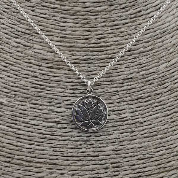 Silver necklace with round lotus pendant