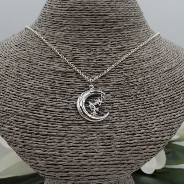 Silver necklace with moon and star pendant