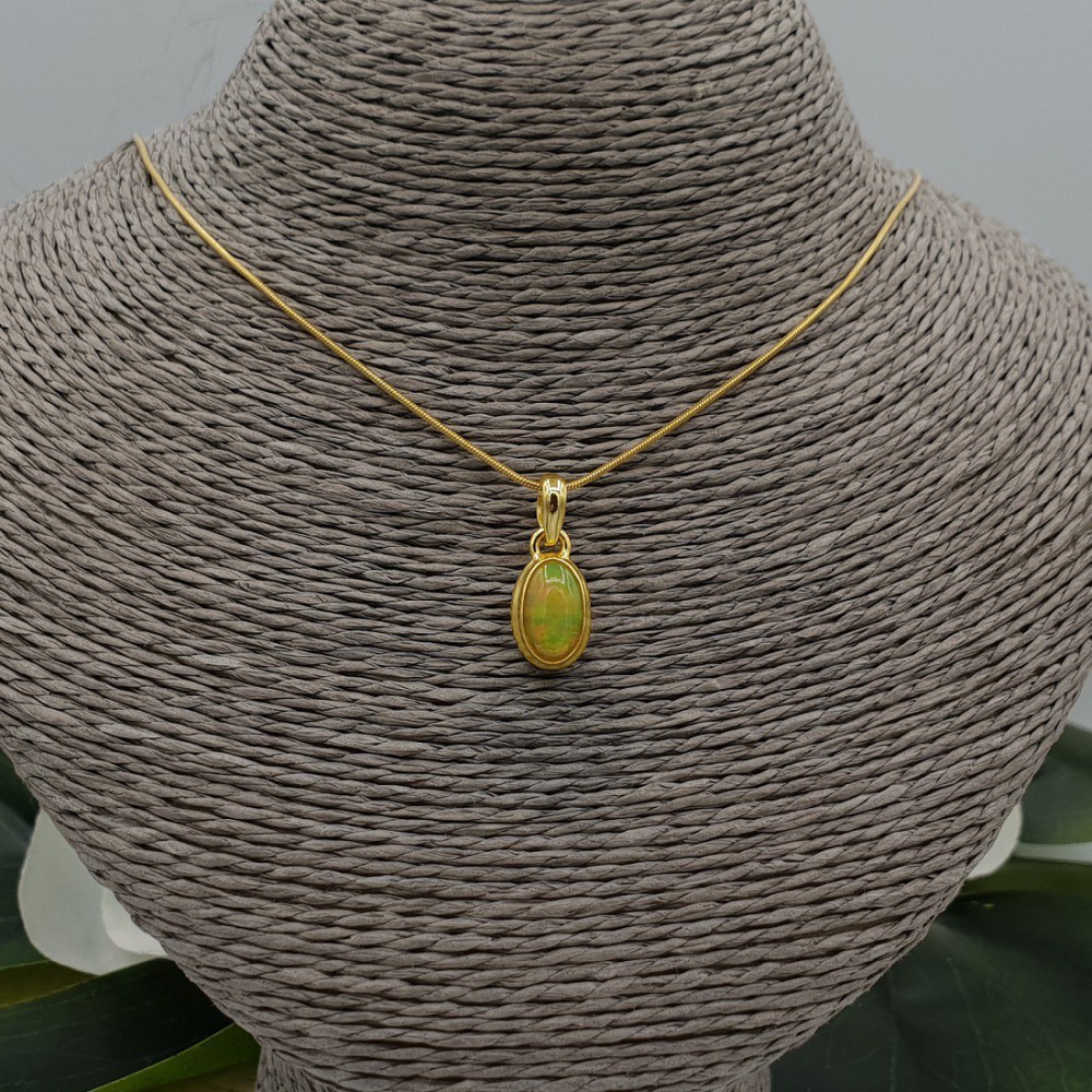 Gold plated necklace with pendant set with oval Etiopische Opal