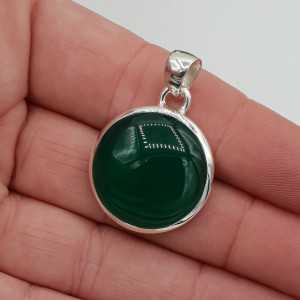 Silver pendant set with round green Onyx
