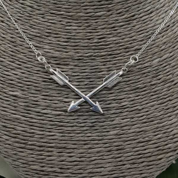 Silver necklace with two arrows