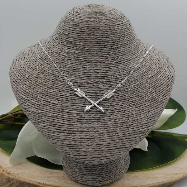 Silver necklace with two arrows
