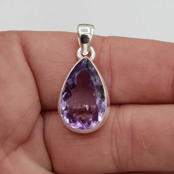 Silver pendant set with oval facet cut Amethyst