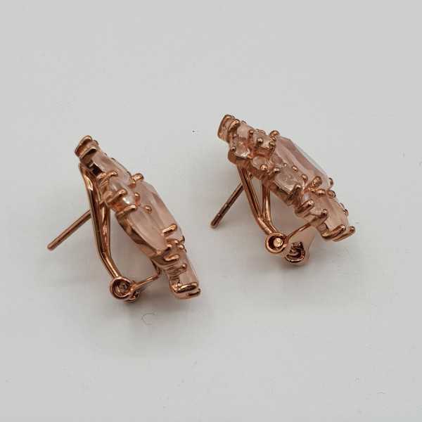 Rosé gold earrings set with facet cut rose quartz