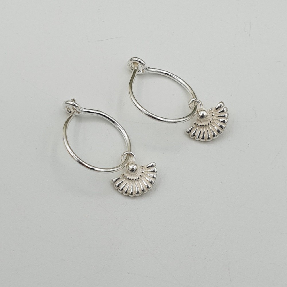 Silver creoles with a fan pendant