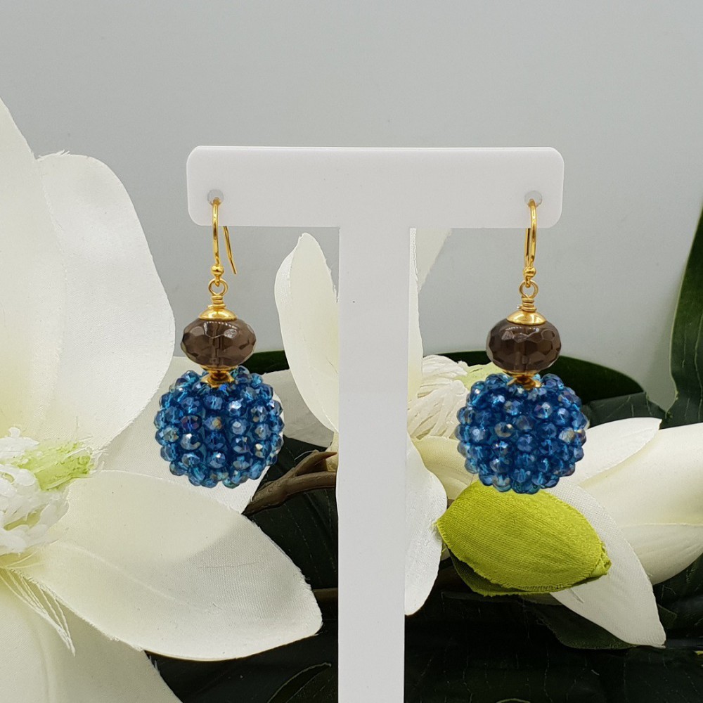 Gold plated earrings with Smokey Topaz and full of Petrol blue crystals